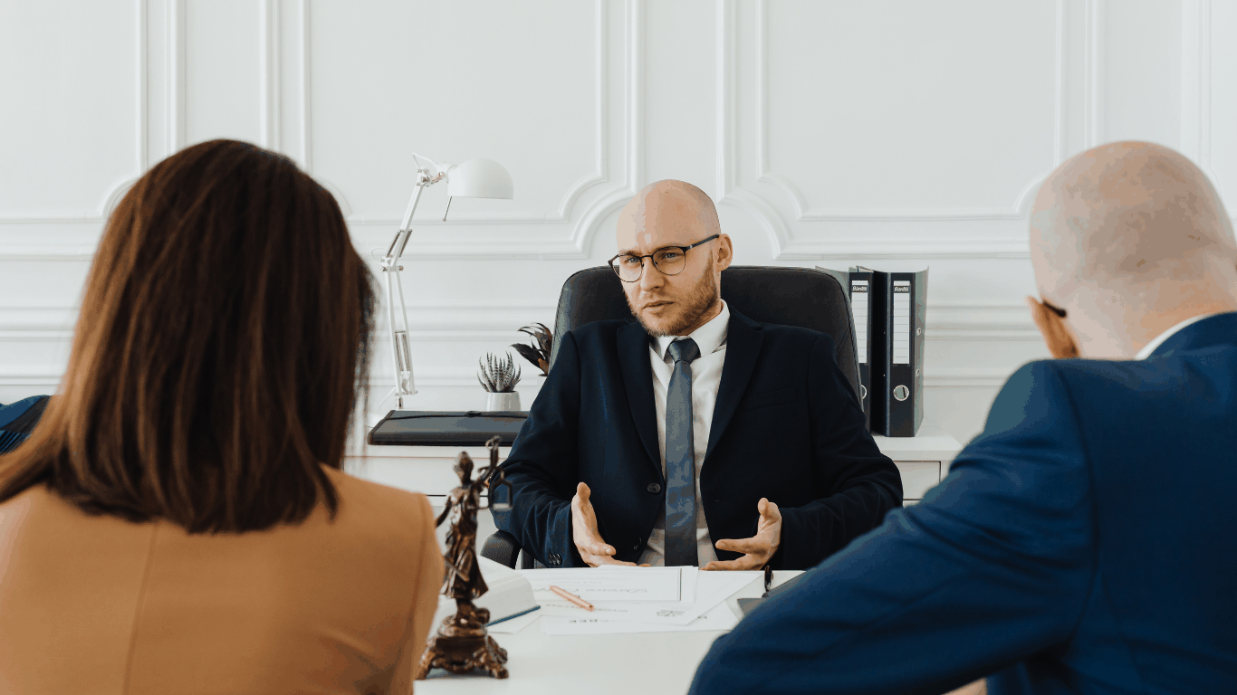 Attorney reviewing expert witness credentials and financial documents in a white collar fraud case